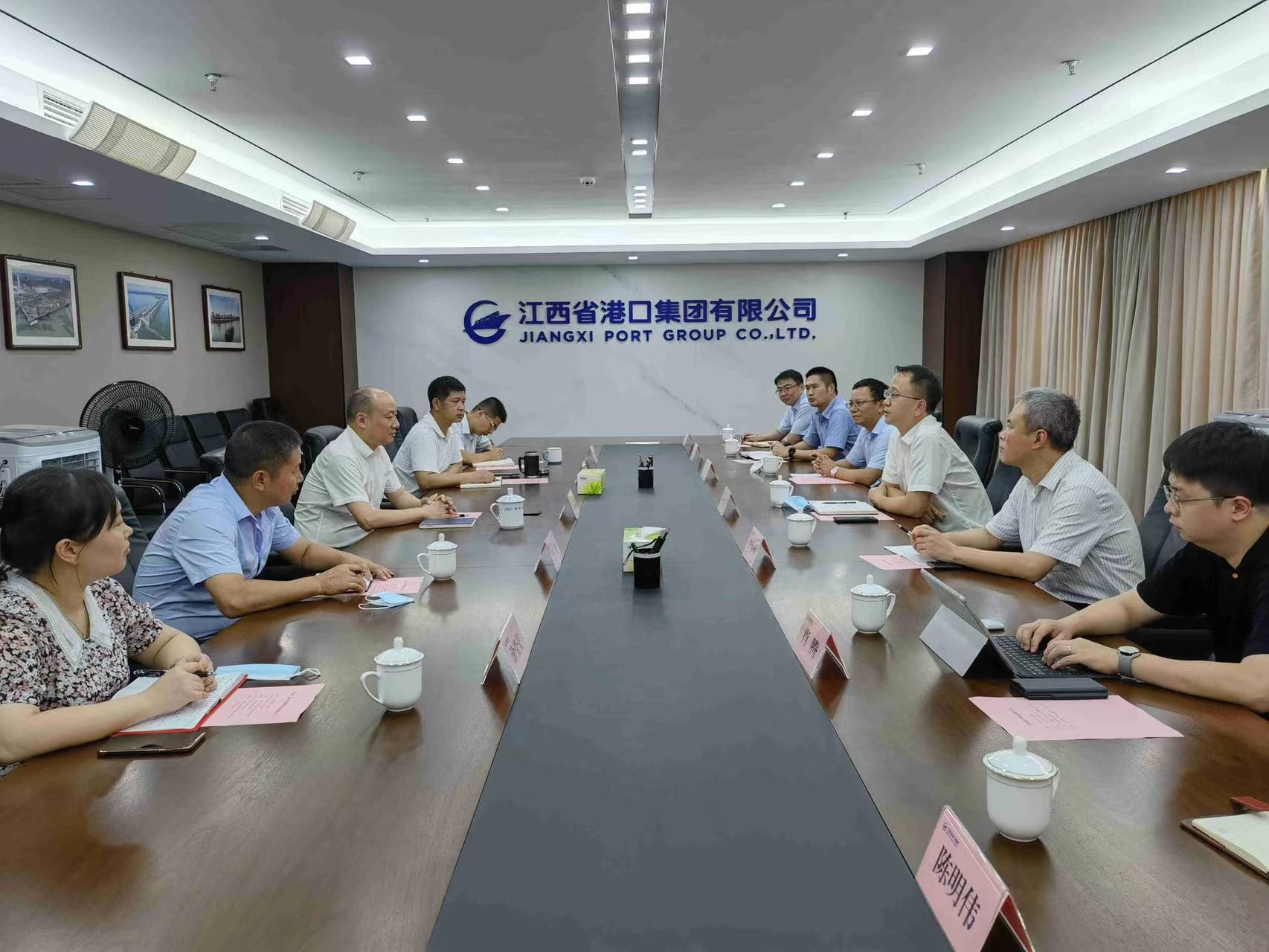 公司党委副书记、总经理宋文涛拜会江西省港口集团党委书记、董事长徐重财